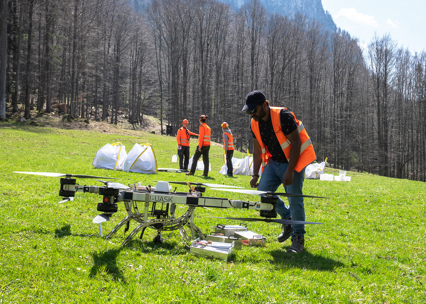 FlyingBasket operator checking the drone